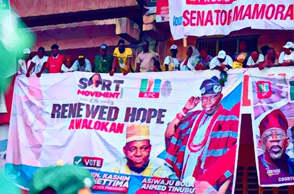 A young Nigerian citizen holding a sign for jobs, symbolizing unfulfilled political promises