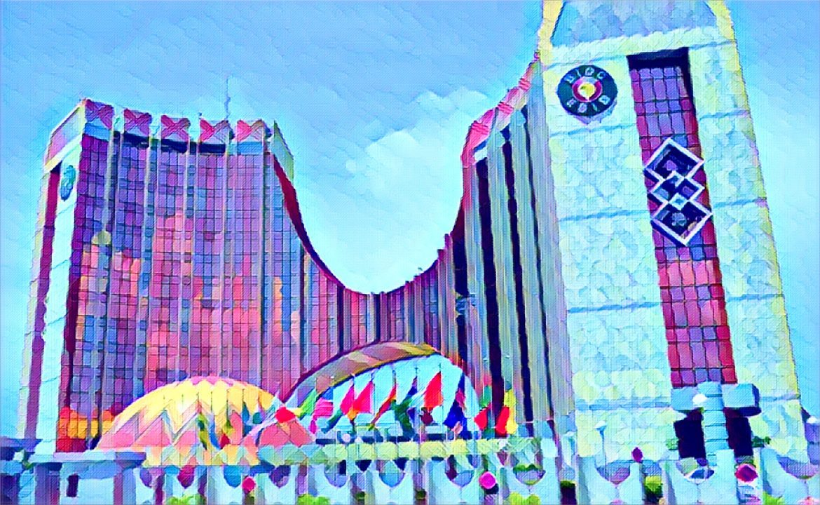 Nigeria boosts ECOWAS Bank shares with $100 million capital Nigeria’s flag waving beside the ECOWAS Bank headquarters building